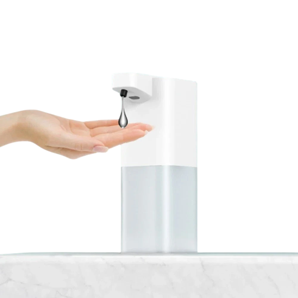 zero2cart white touchless automatic soap dispenser dispensing soap into a hand on a marble surface