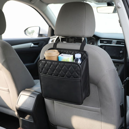 Unbranded car seat back organizer bag hanging from the back of a car seat, showcasing its simple design and storage pockets in a realistic vehicle interior.