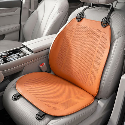 Macro close-up of a ventilated car seat cushion highlighting PVC material texture and contours, set against a blurred car interior background.