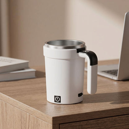 Full-body shot of a small self-stirring coffee mug on a sleek wooden desk, emphasizing portability for home or office use.