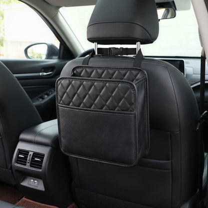Full view of a small car seat organizer hanging from the front seat in a well-lit vehicle interior, emphasizing its practical and straightforward design.