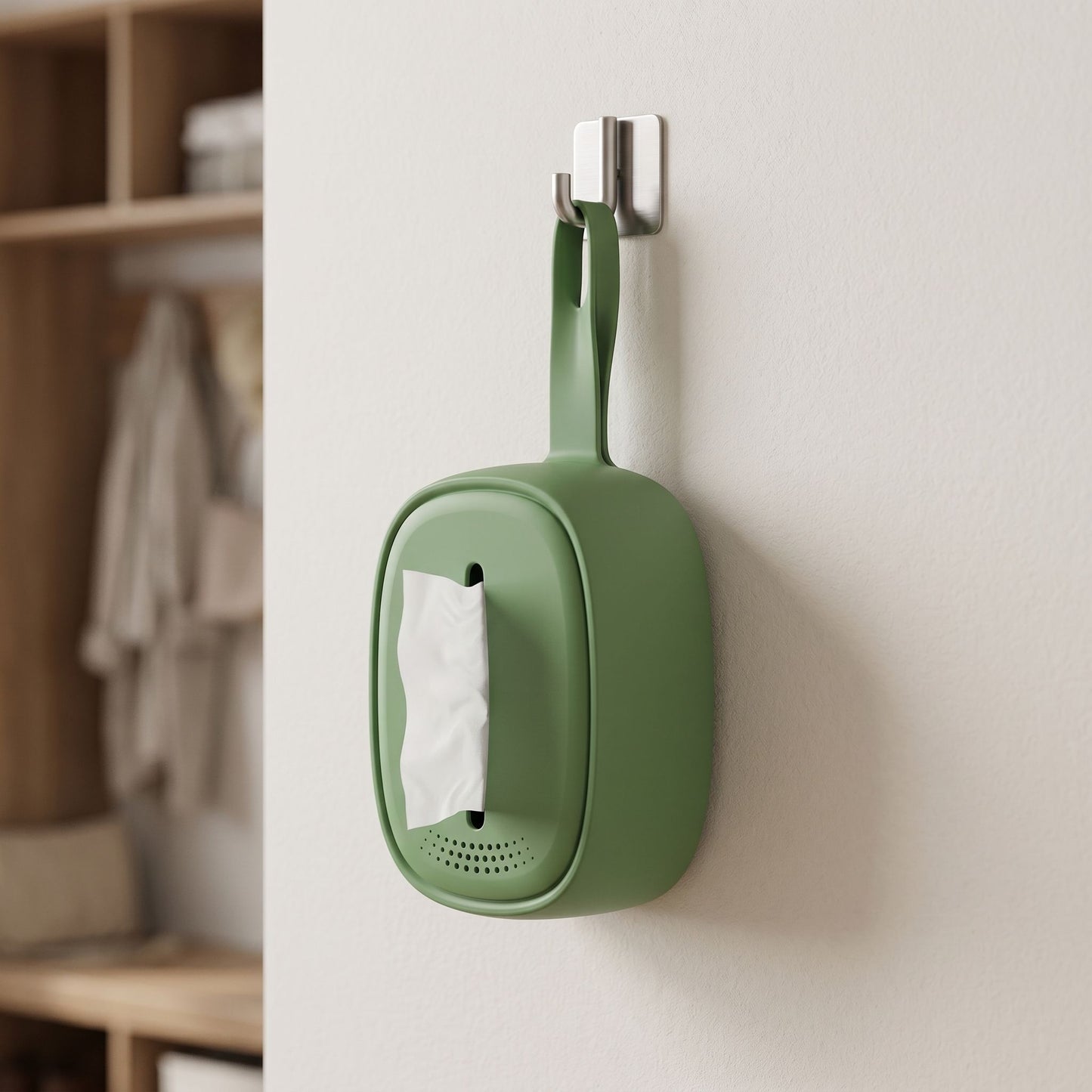 Side perspective of a tiny silicone tissue holder attached inside a home or office, showing its flexibility and everyday practicality.