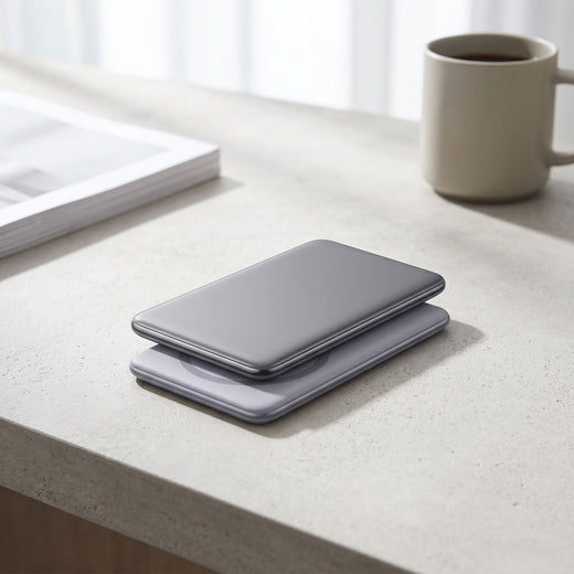 Lifestyle scene showing the compact magnetic power bank on a modern desk with natural light, emphasizing portability.
