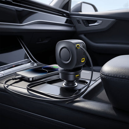 Minimalist 100W retractable car charger in a modern vehicle, centered in the lighter socket with extended cable and natural lighting.