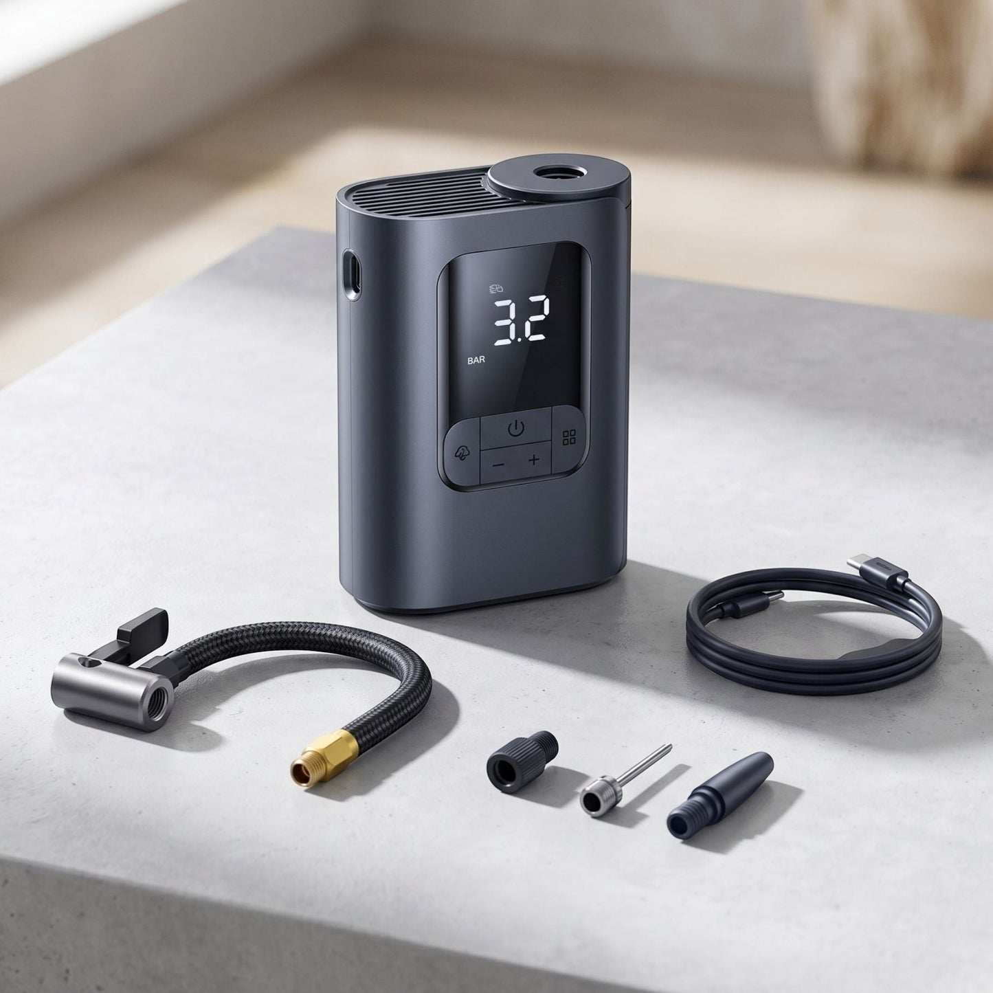 Unbranded portable digital tire inflator with LCD display, showcased on a clean surface in a modern studio setting.