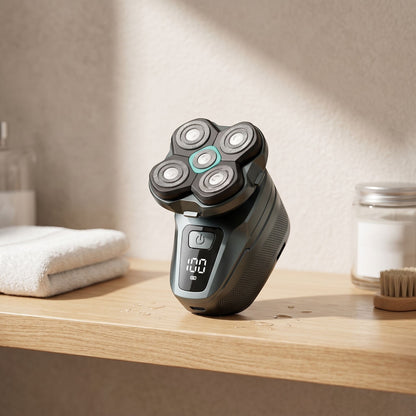 Full-body shot of a small cordless electric head shaver on a wooden bathroom shelf with natural daylight, showcasing its waterproof feature.