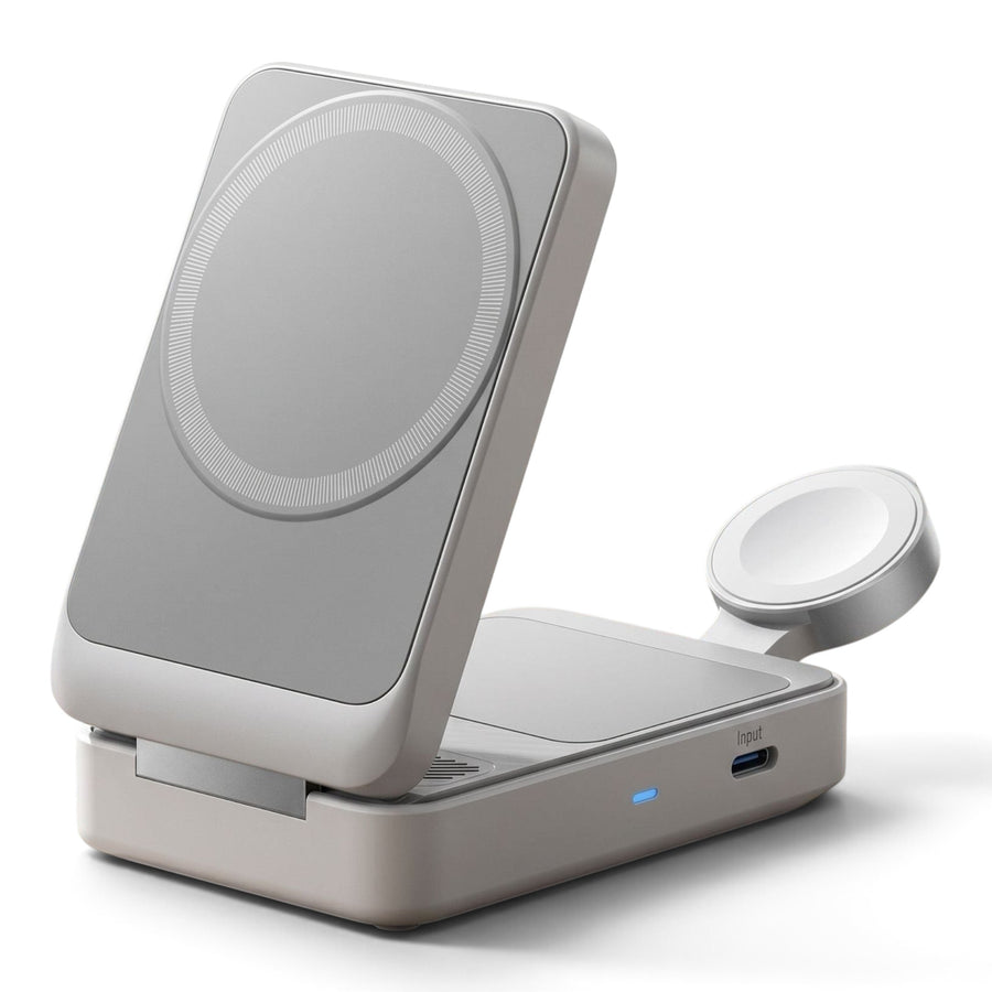 Full view of a sleek 10000mAh 35W mini power bank standing upright on a minimalist wooden desk in an organized office environment.