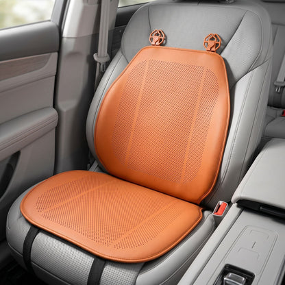 Realistic studio shot of a ventilated car seat cushion on a modern front seat, showcasing textured PVC surface and universal fit in a neutral car interior.