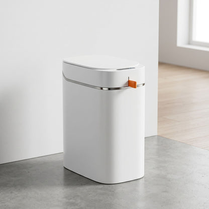 Minimalist rechargeable sensor trash can mounted or standing in a contemporary office space, highlighting its slim profile and sensor lid.