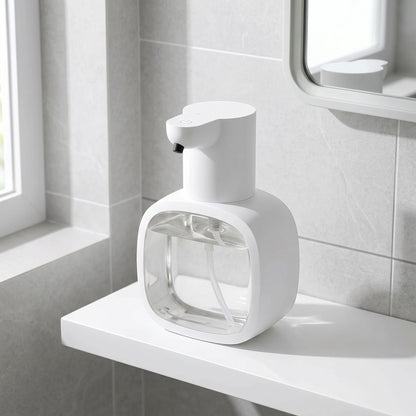 zero2cart white automatic foam soap dispenser with a clear 500ml reservoir on a bathroom shelf