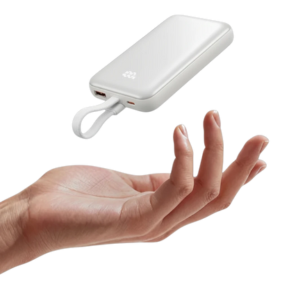 zero2cart beige 10000mAh magnetic wireless power bank with digital display hovering above a hand