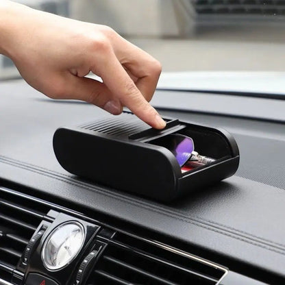 zero2cart black telescopic car dashboard storage box with a sliding lid holding glasses and keys on a car console
