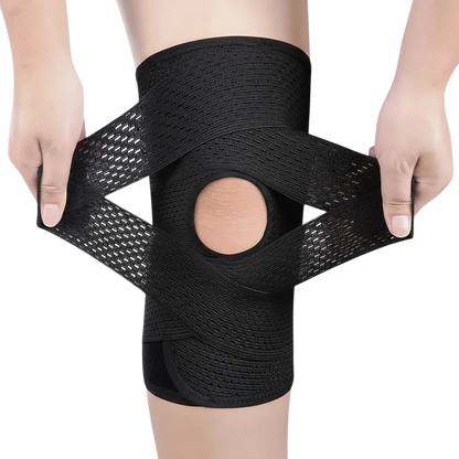 zero2cart black open-patella compression knee brace with adjustable straps and side stabilizers on a person's knee