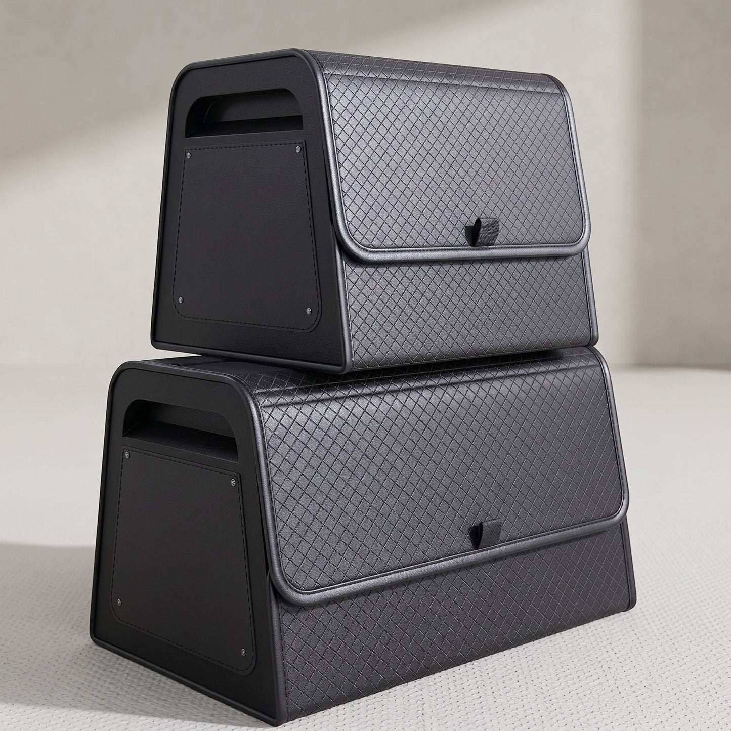 zero2cart black PU leather magnetic car trunk organizers in two sizes stacked on a light surface
