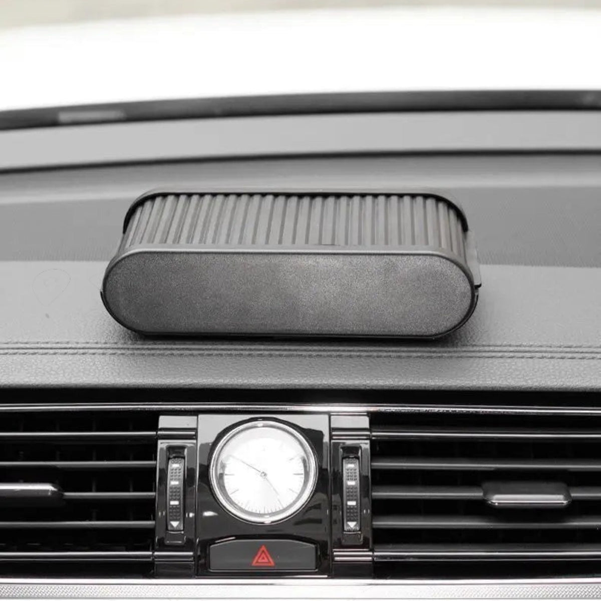 zero2cart black telescopic car dashboard storage box with a lid, mounted on a vehicle console for organizing essentials.