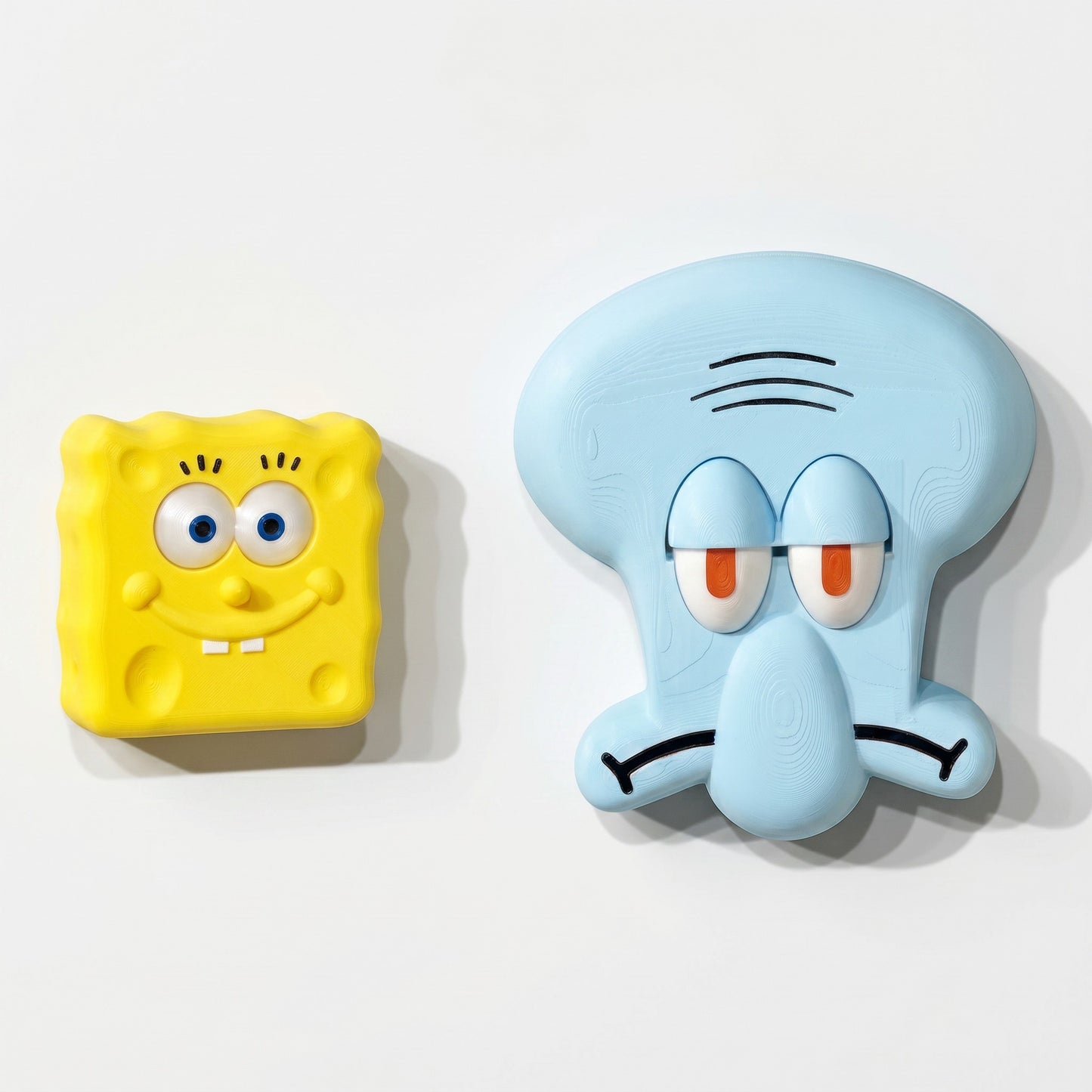 zero2cart 3D cartoon PVC wall switch covers featuring yellow SpongeBob and light blue Squidward designs.