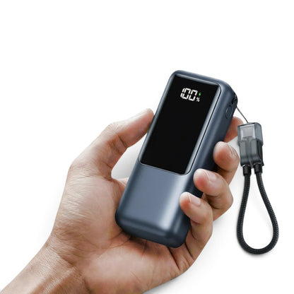 zero2cart compact 10000mAh power bank with digital display and built-in USB-C cable held in hand