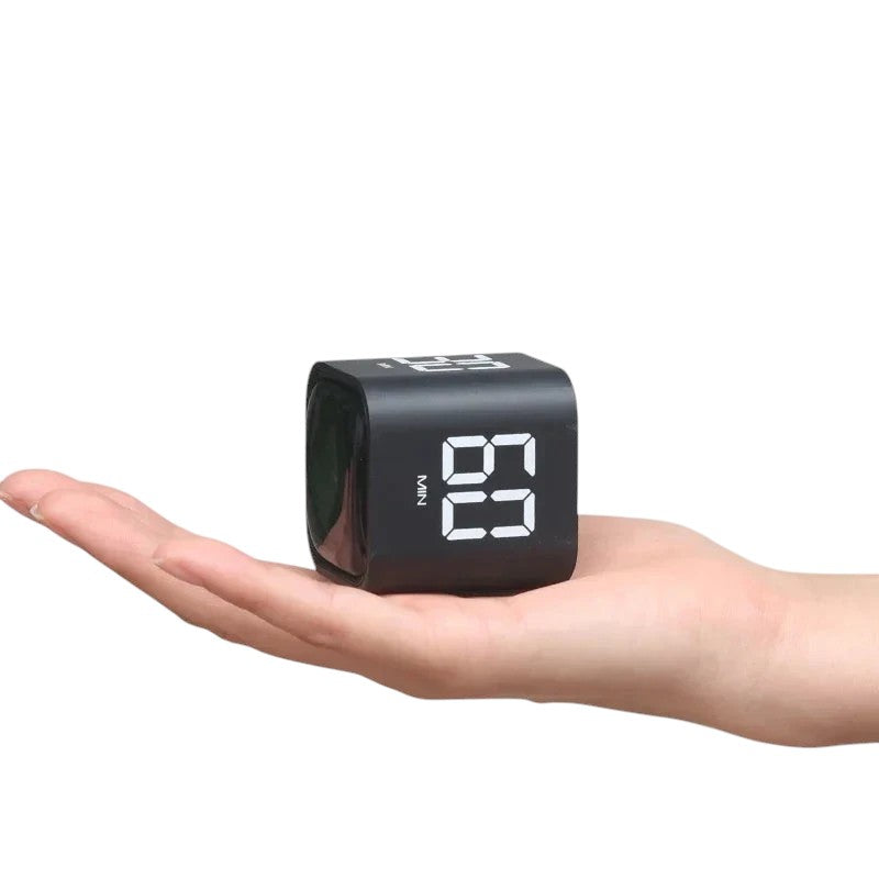 zero2cart compact black digital cube timer for study and kitchen held in a hand showing 60 minutes on the display
