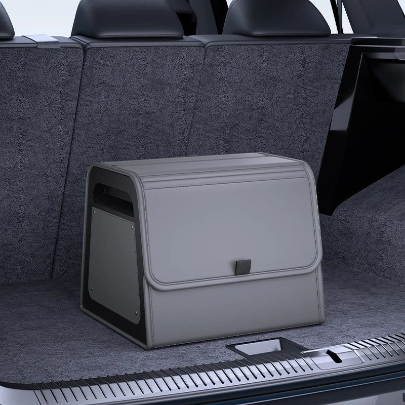 zero2cart grey PU leather car trunk organizer with magnetic closure and reinforced frame sitting in a vehicle trunk