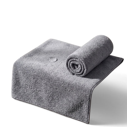 zero2cart grey microfiber car drying towel with a soft, absorbent texture, shown folded and rolled.