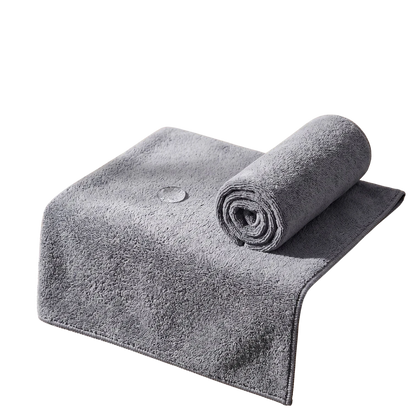 zero2cart grey microfiber car drying towel with a soft, absorbent texture, shown folded and rolled.