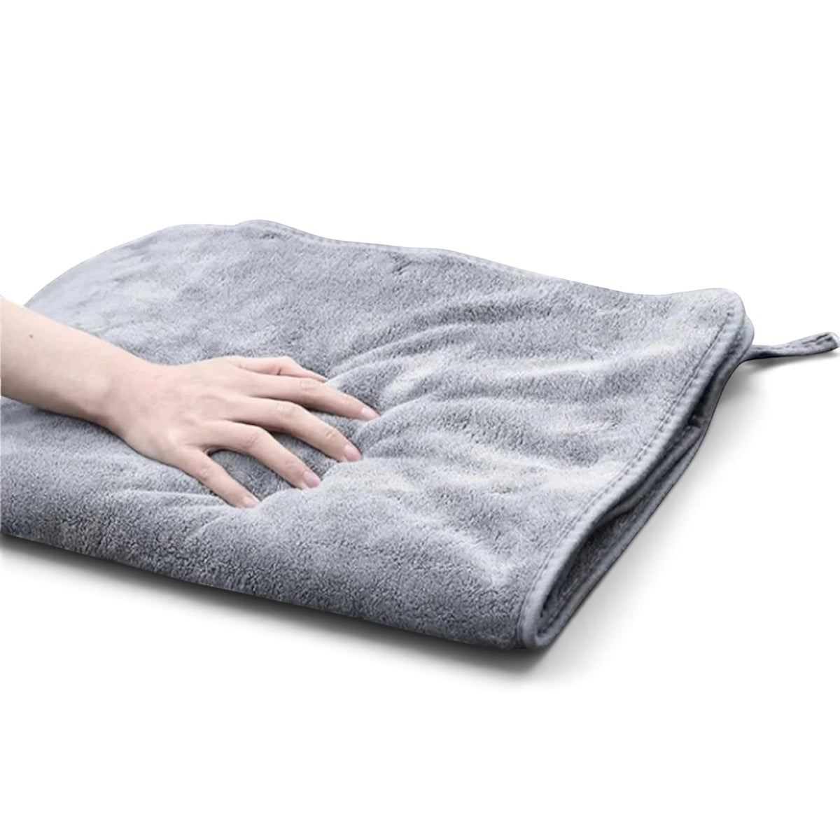 zero2cart grey microfiber car drying towel with soft plush texture being pressed by a hand