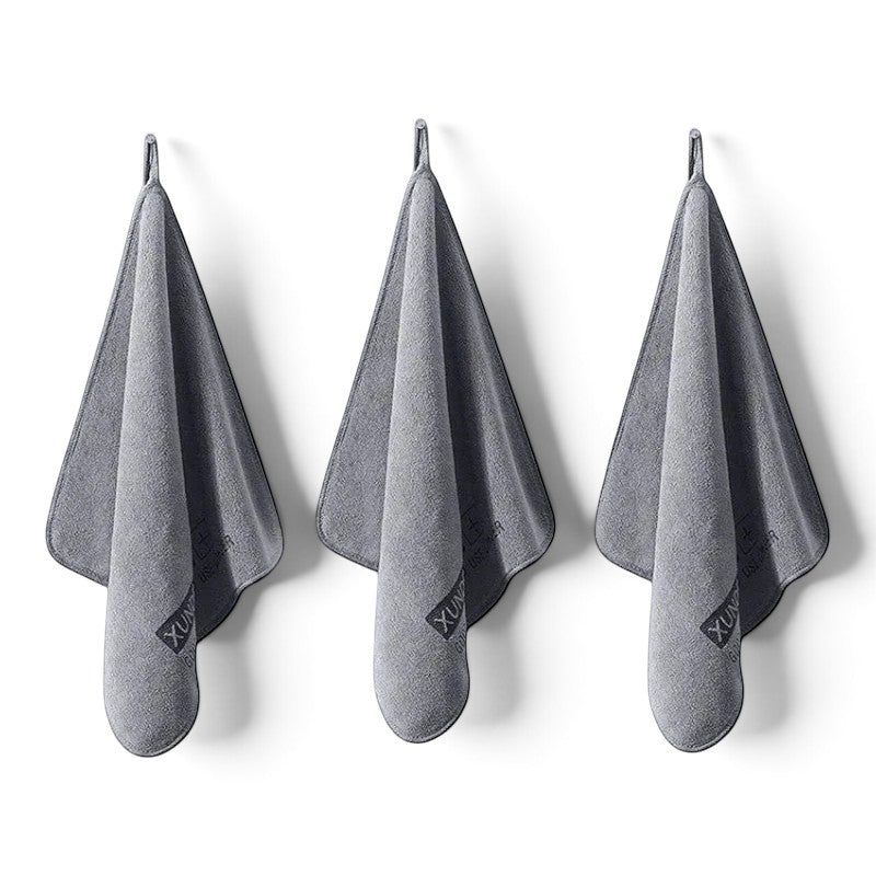 Three grey zero2cart microfiber towels with hanging loops for kitchen, bathroom, or car cleaning use.