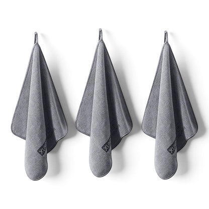 Three grey zero2cart microfiber towels with hanging loops for kitchen, bathroom, or car cleaning use.