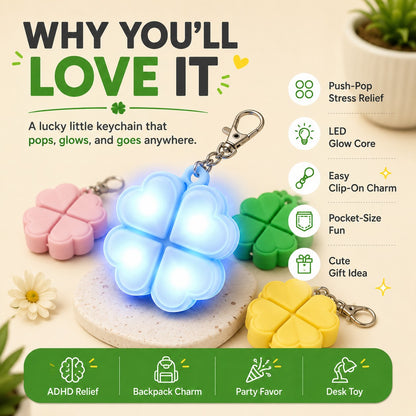 zero2cart light-up four-leaf clover pop it fidget keychain in blue, pink, green, and yellow with metal clasp