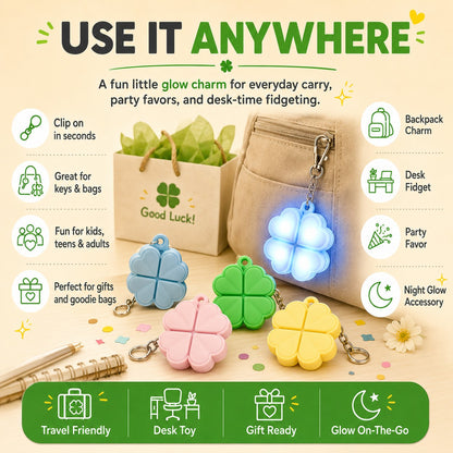 zero2cart light-up four-leaf clover pop it keychains in green, blue, pink, and yellow on a desk with a backpack.