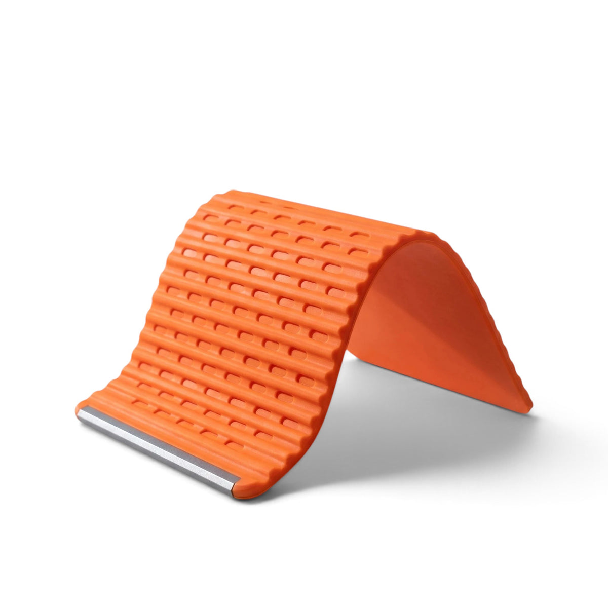 zero2cart orange foldable silicone phone stand with a textured surface for stable desk viewing