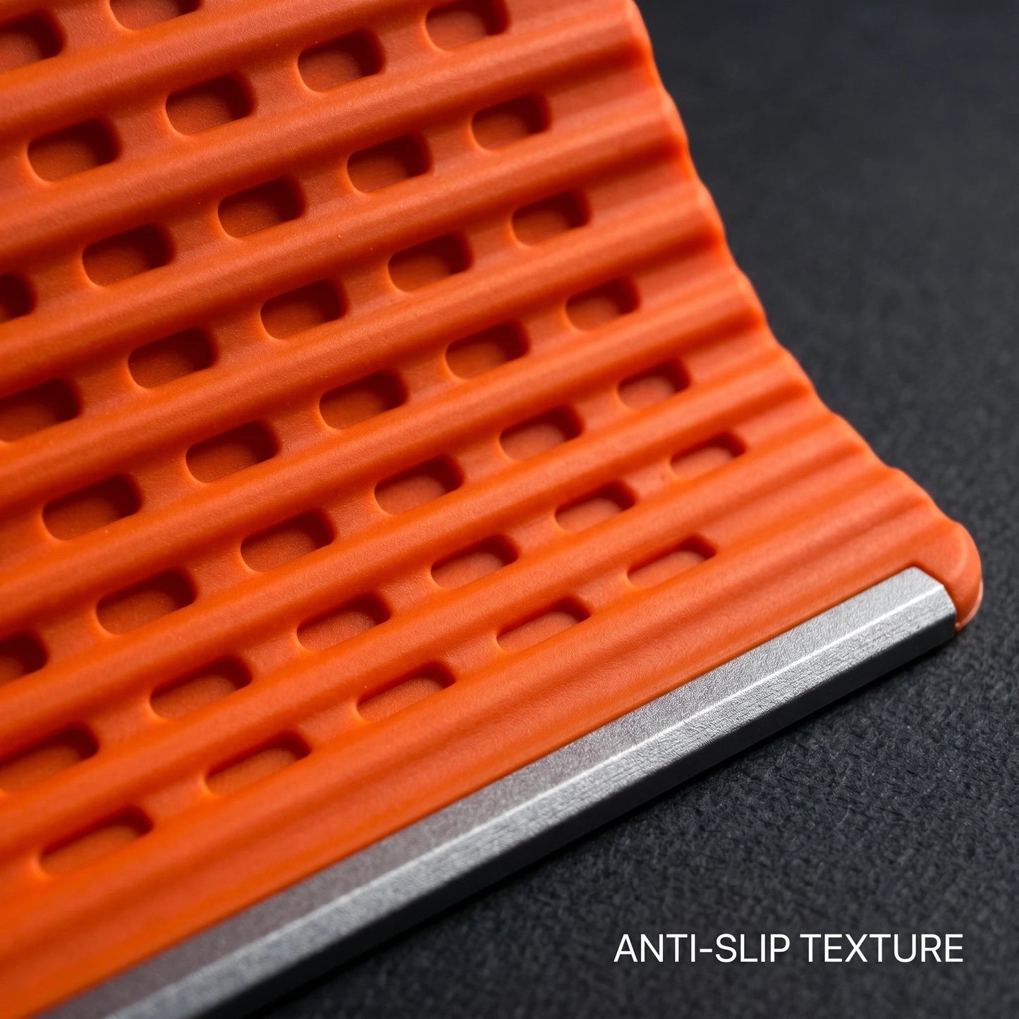 zero2cart orange foldable silicone phone stand with anti-slip textured surface for secure device viewing