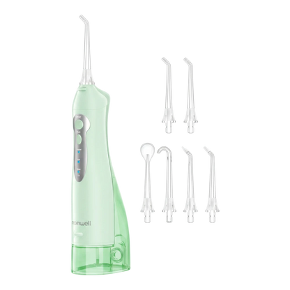 zero2cart portable cordless water flosser in mint green with five interchangeable nozzles for oral care