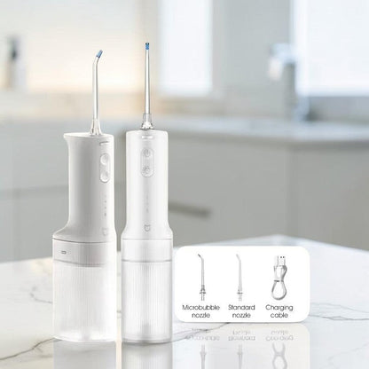 zero2cart portable electric water flosser in white with 3 modes, 2 nozzles, and USB-C charging for oral care.