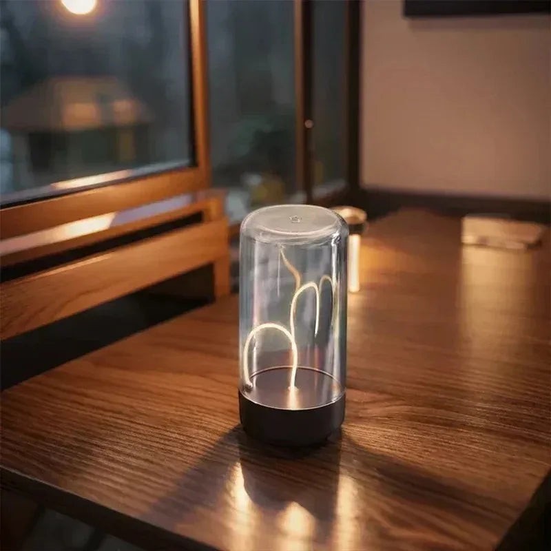zero2cart minimalist rechargeable ambient night light with a clear cylindrical dome and warm glowing filament