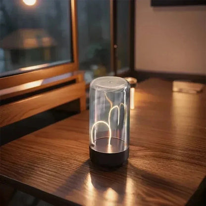 zero2cart minimalist rechargeable ambient night light with a clear cylindrical dome and warm glowing filament
