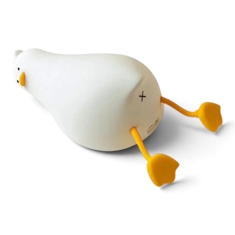 zero2cart rechargeable duck night light with soft white silicone body and bright orange feet on a black background
