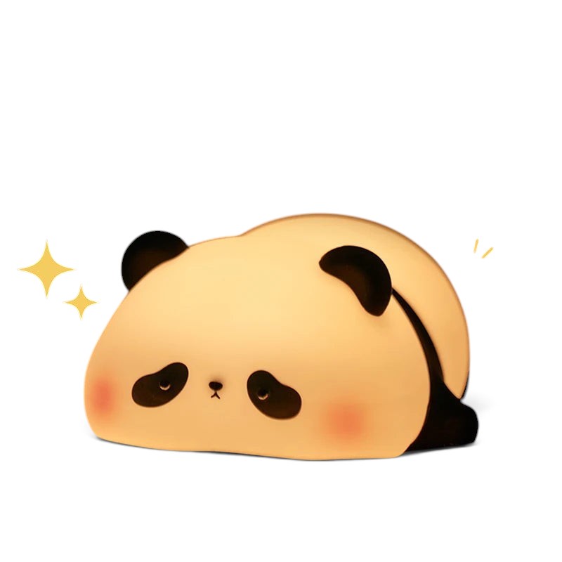 zero2cart rechargeable panda night light with soft silicone body emitting a warm glow on a bed
