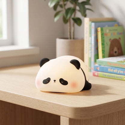 zero2cart rechargeable panda night light with soft silicone body glowing on a wooden desk in a nursery