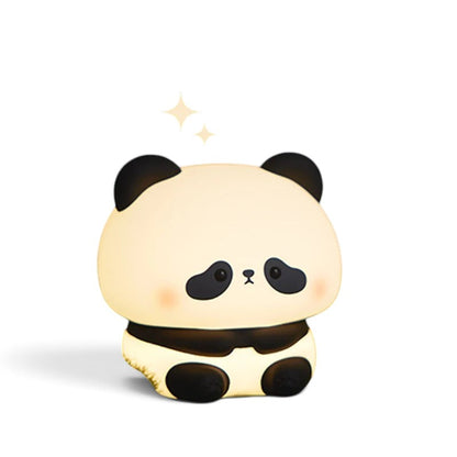 zero2cart rechargeable panda night light with soft silicone body glowing on a grassy surface