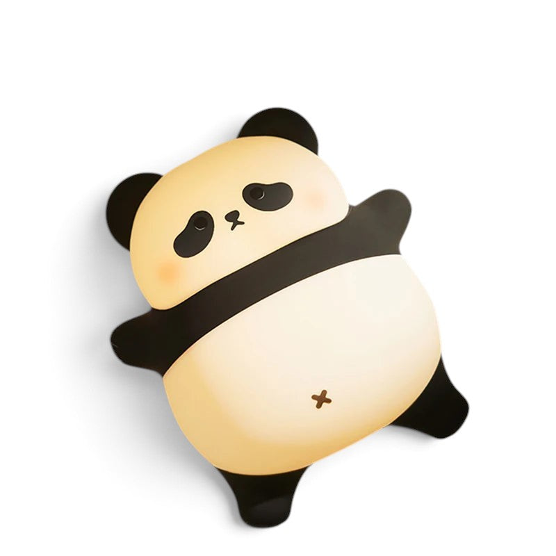 zero2cart rechargeable panda night light with soft silicone body glowing on a fluffy white surface