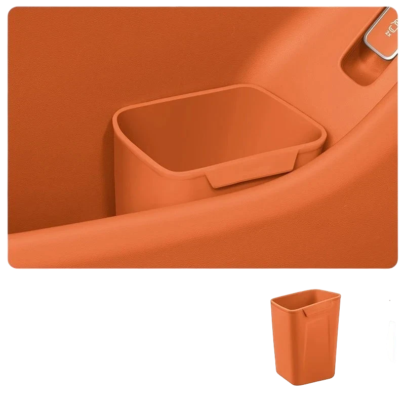 zero2cart orange silicone car door trash bin and organizer clipped onto a vehicle door panel