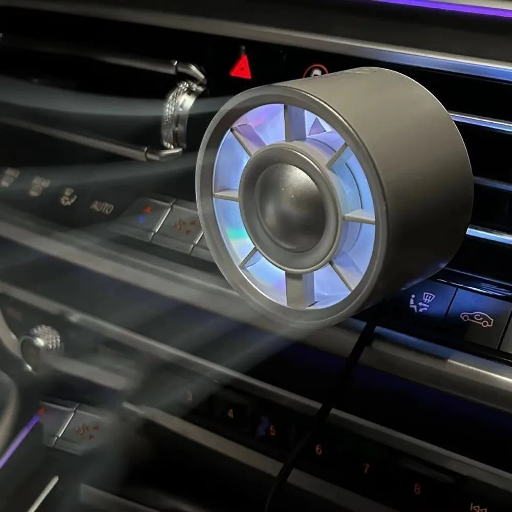 zero2cart USB car air vent fan with colorful LED lighting clipped onto a vehicle dashboard vent for extra cooling