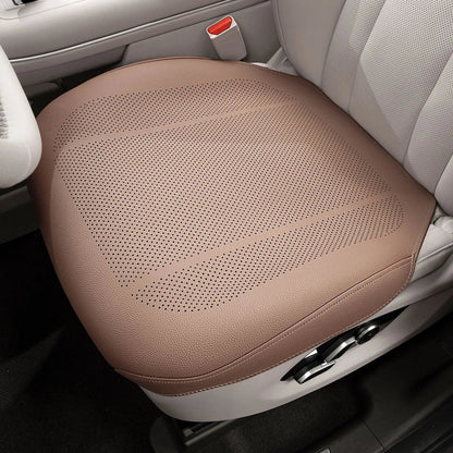 zero2cart tan perforated PVC front car seat cushion for interior protection against spills and daily wear.