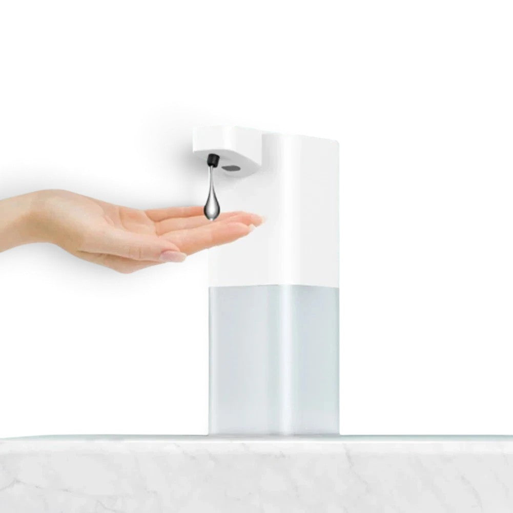 zero2cart white touchless automatic soap dispenser dispensing soap into a hand on a marble surface