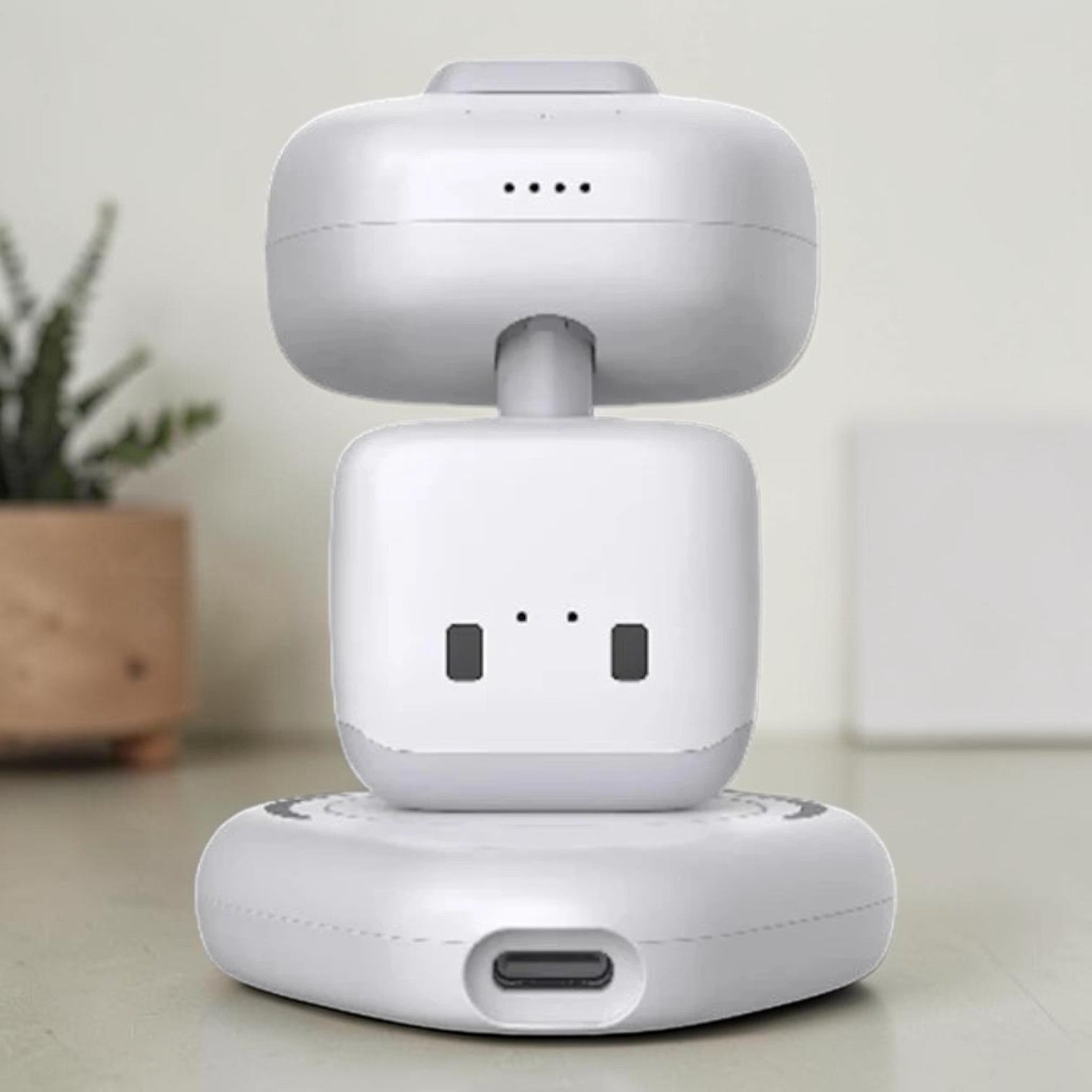 zero2cart white smart interactive robot toy with a rotating camera head and touch-sensing features on a base