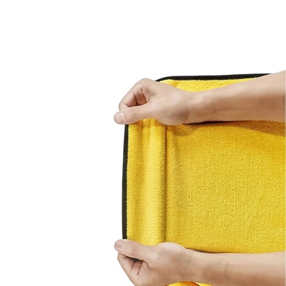 zero2cart yellow microfiber car wash towel being held to show soft texture and absorbent polyester material