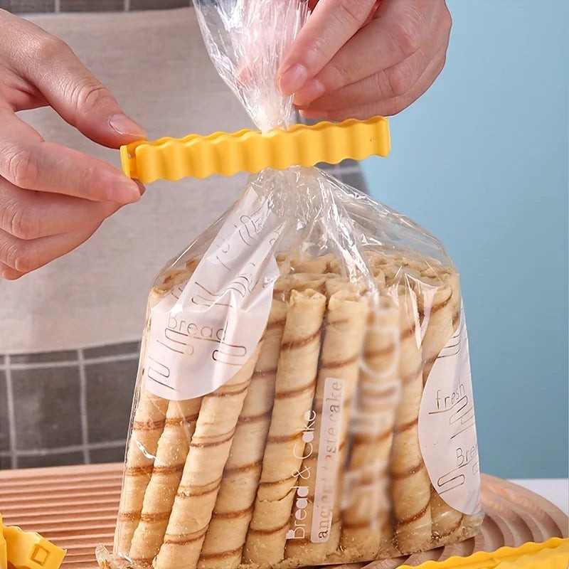 zero2cart yellow plastic bag sealing clip securing a package of wafer rolls for kitchen pantry organization