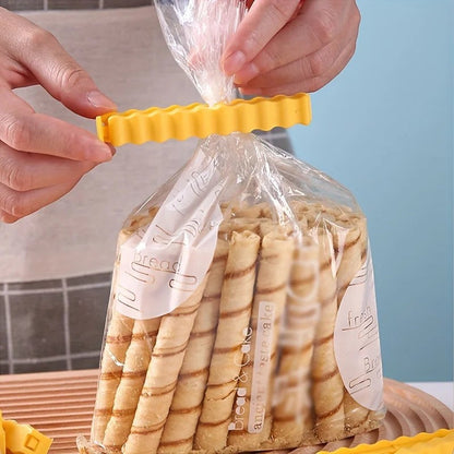 zero2cart yellow plastic bag sealing clip securing a package of wafer rolls for kitchen pantry organization